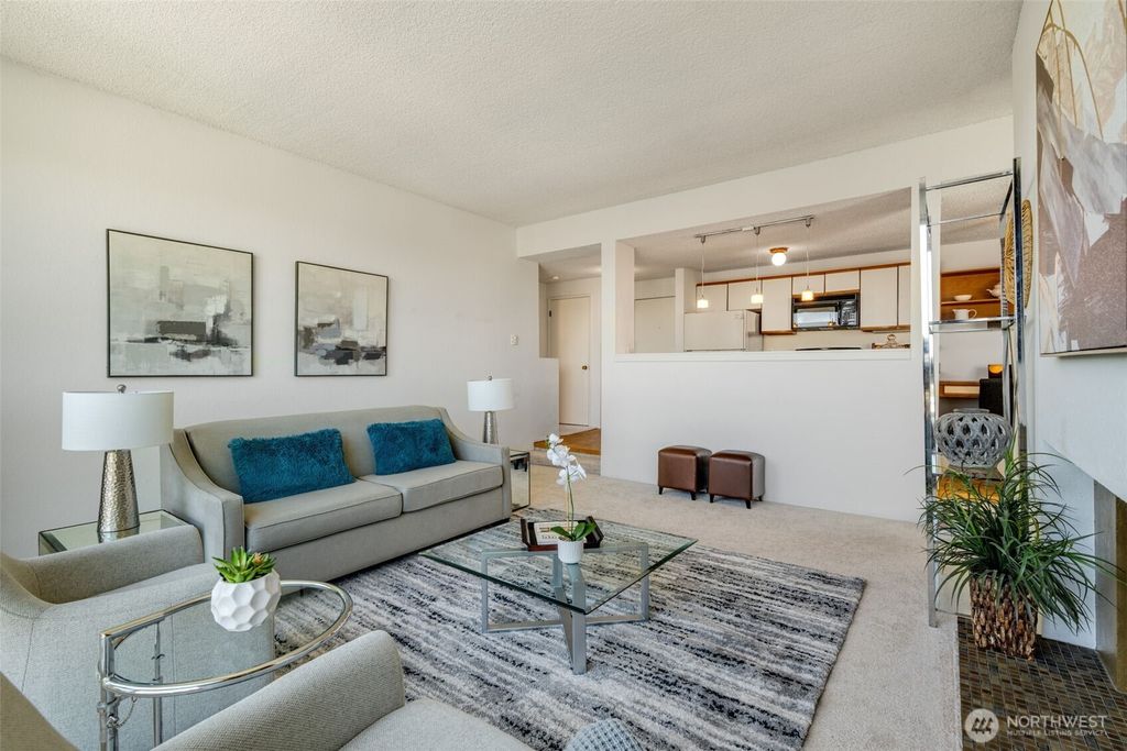 Photo of 3700 26th Place W #402, Seattle, WA 98199 (MLS # 2413629)