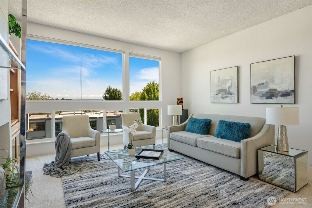 Photo of 3700 26th Place W #402, Seattle, WA 98199 (MLS # 2413629)