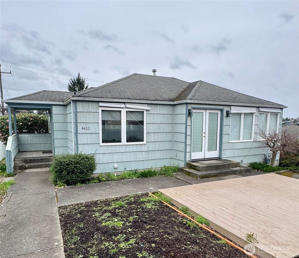 Photo of 4402 49th Avenue SW, Seattle, WA 98116 (MLS # 2492020)