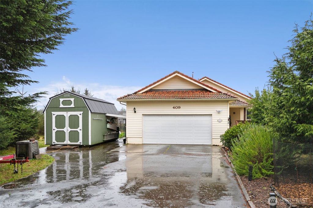 Photo of 409 Duck Lake Drive SE, Ocean Shores, WA 98569 (MLS # 2464946)