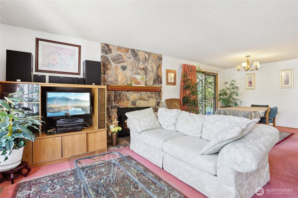 Photo of 8103 30th Avenue SW, Seattle, WA 98126 (MLS # 2507526)