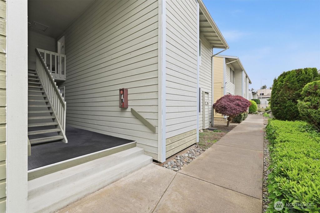 Photo of 14401 SE Petrovitsky Road #E101, Renton, WA 98058 (MLS # 2518660)