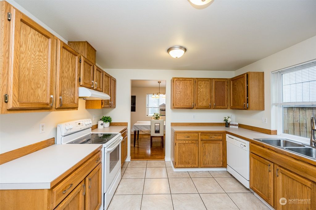 Photo of 443 Washington Boulevard, Algona, WA 98001 (MLS # 2041183)