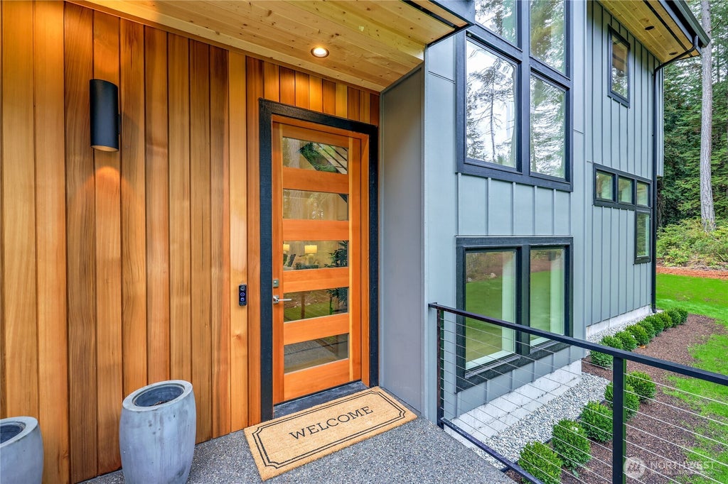 Photo of 6015 Chorus Frog Street NE, Bainbridge Island, WA 98110 (MLS # 2588545)