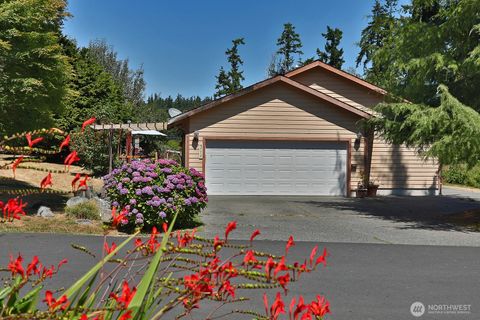 Photo of 5772 Captain Vancouver Drive, Langley, WA 98260 (MLS # 2415554)
