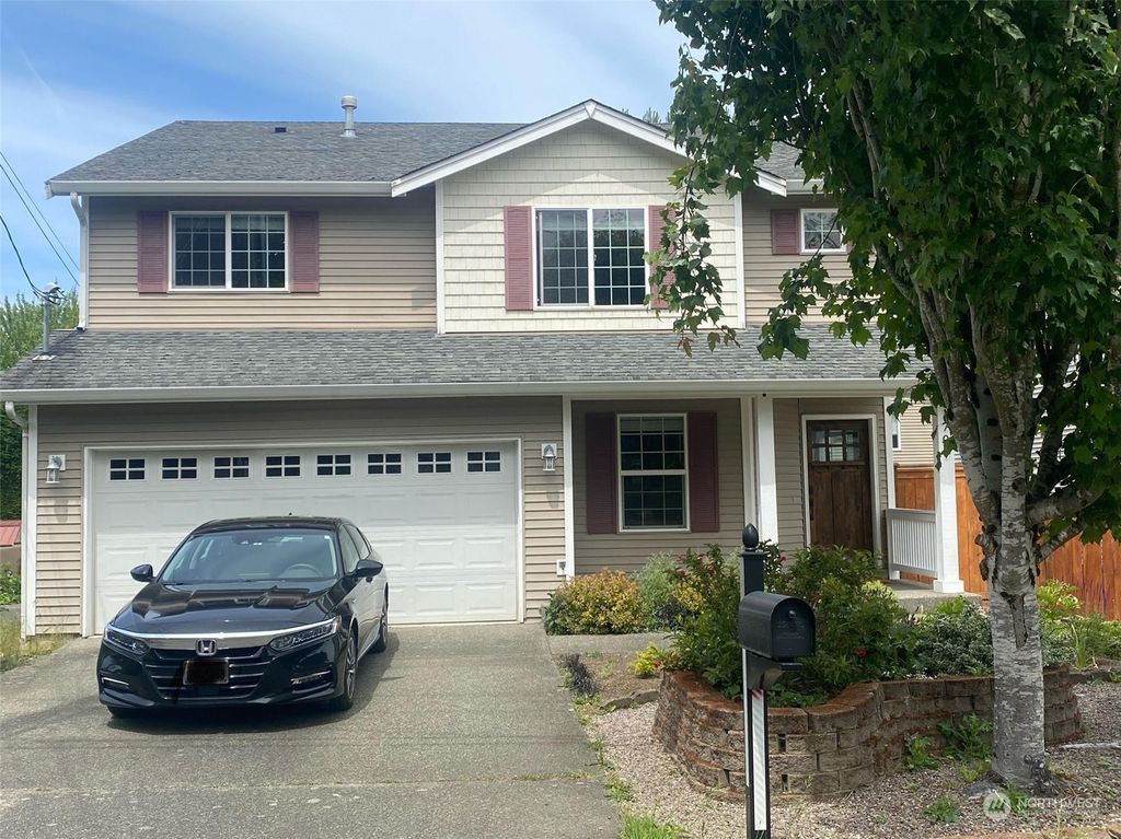 Photo of 1706 SW Holly Street, Seattle, WA 98106 (MLS # 2250895)