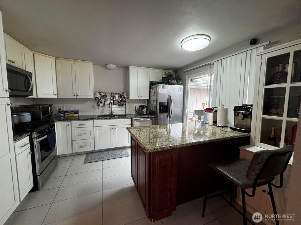 Photo of 14060 35th Avenue S, Tukwila, WA 98168 (MLS # 2507405)