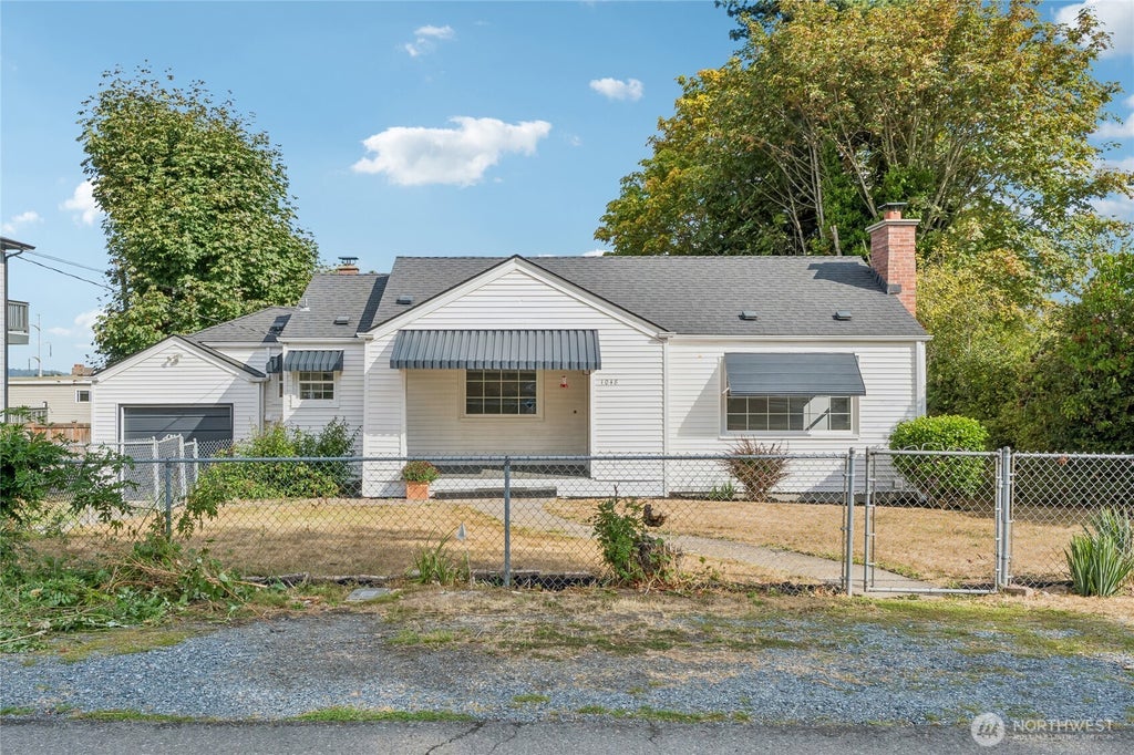 Photo of 1048 S 100th Street, Seattle, WA 98168 (MLS # 2579092)