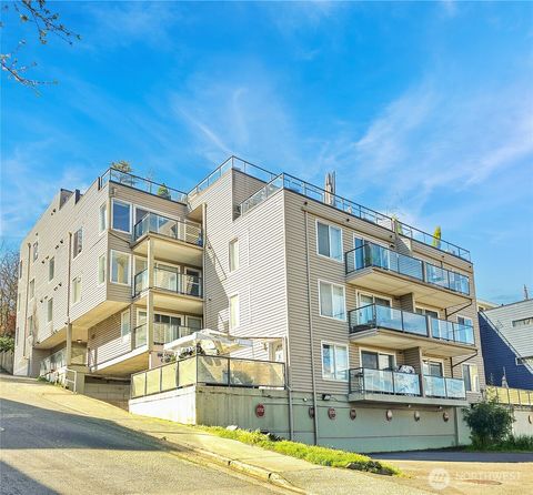 Photo of 3022 SW Bradford Street #210, Seattle, WA 98126 (MLS # 2510595)