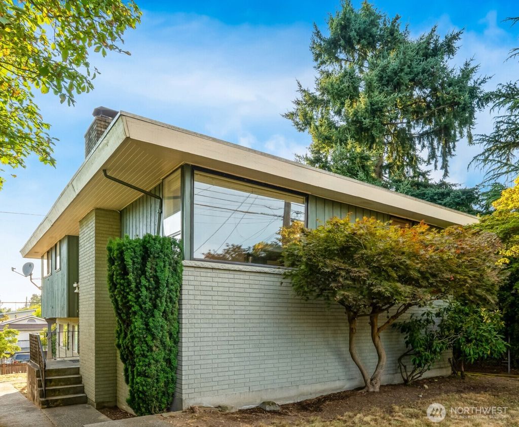 Photo of 8613 16th Avenue SW, Seattle, WA 98106 (MLS # 2411198)