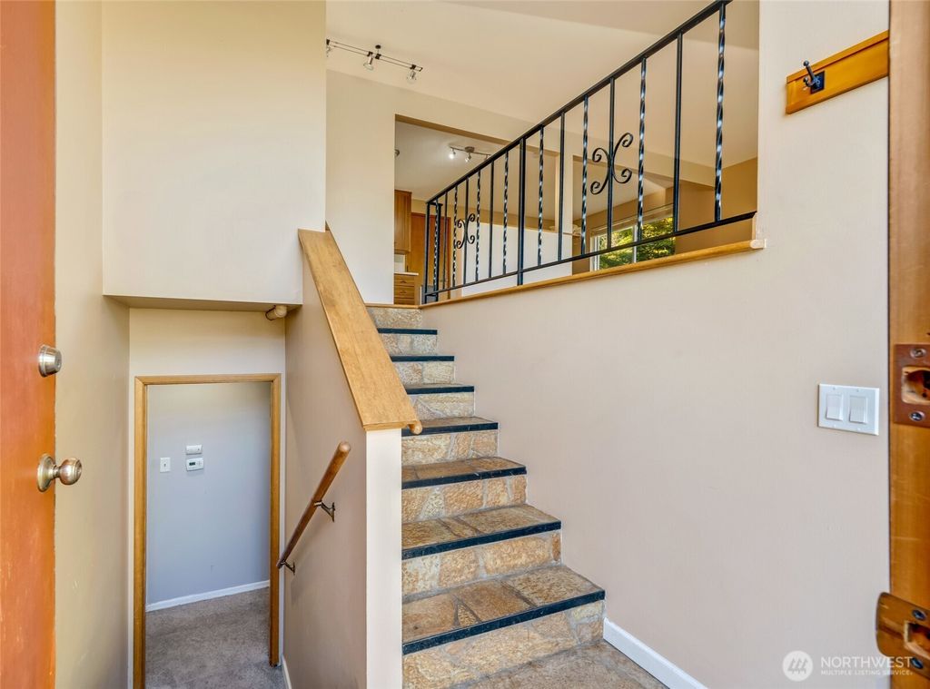 Photo of 8613 16th Avenue SW, Seattle, WA 98106 (MLS # 2411198)