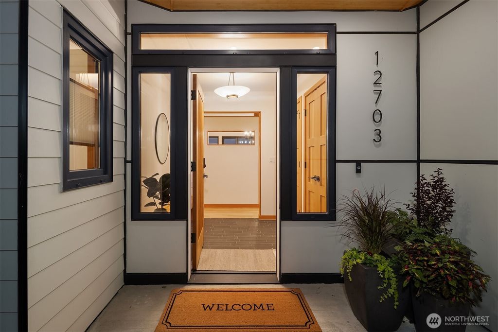 Photo of 12703 9th Avenue NW, Seattle, WA 98177 (MLS # 2432172)