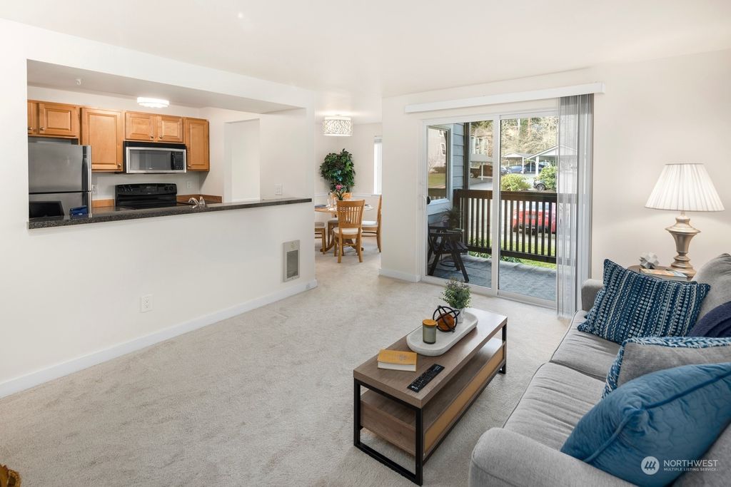 Photo of 6700 NE 182nd Street #A203, Kenmore, WA 98028 (MLS # 2331780)