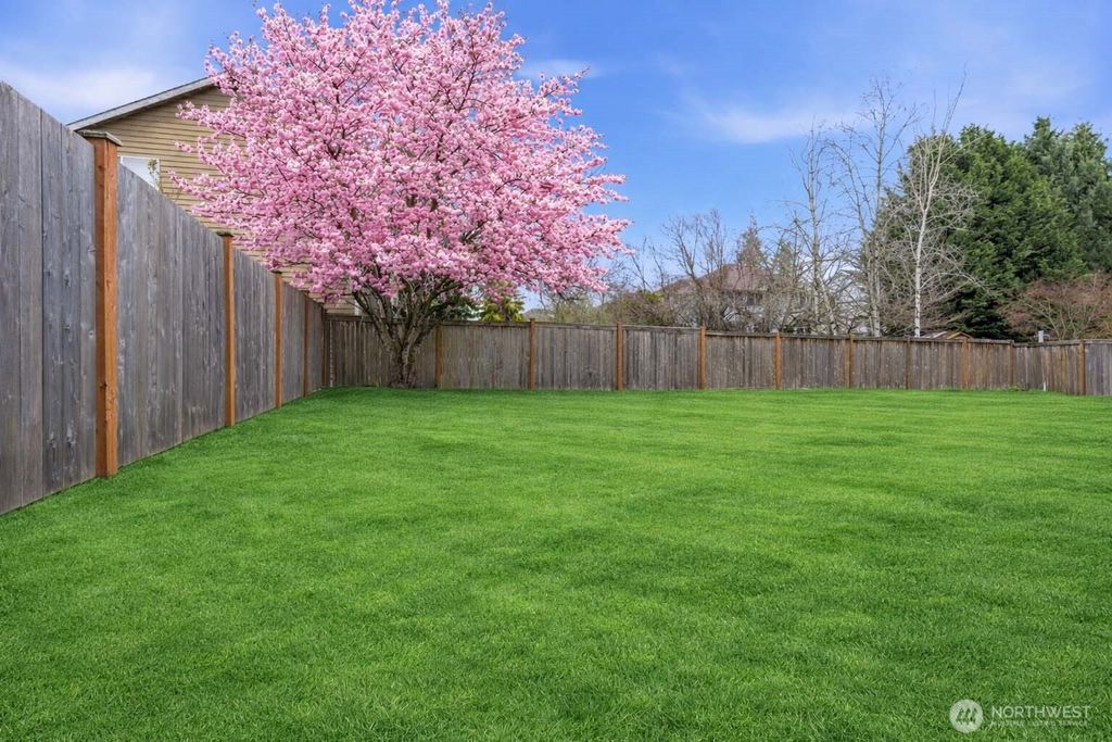 Photo of 4108 NE 7th Street, Renton, WA 98059 (MLS # 2484355)