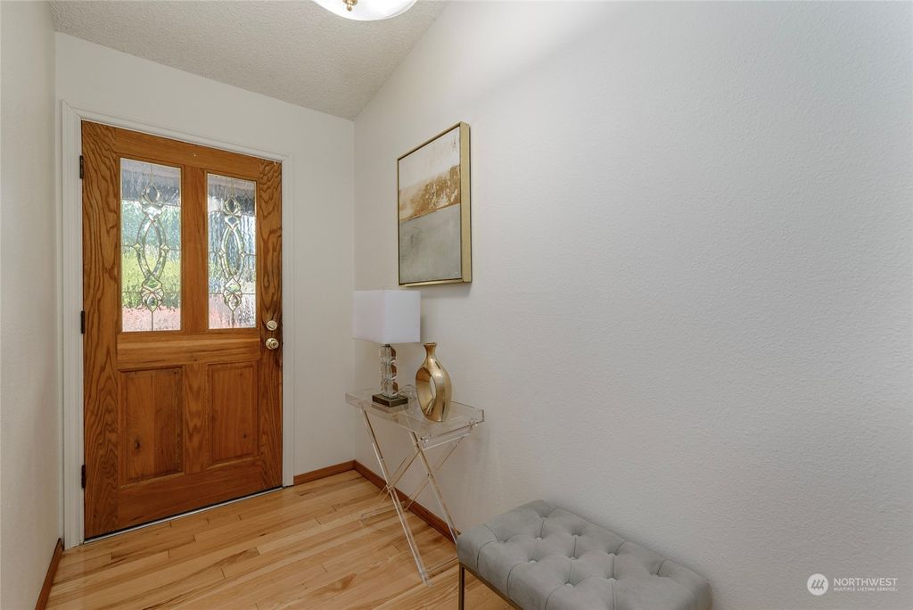 Photo of 14302 SE 162nd Place, Renton, WA 98058 (MLS # 2077972)