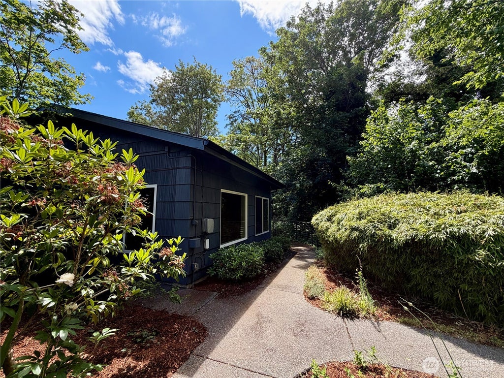 Photo of 10021 7th Avenue NW #E, Seattle, WA 98177 (MLS # 2535546)