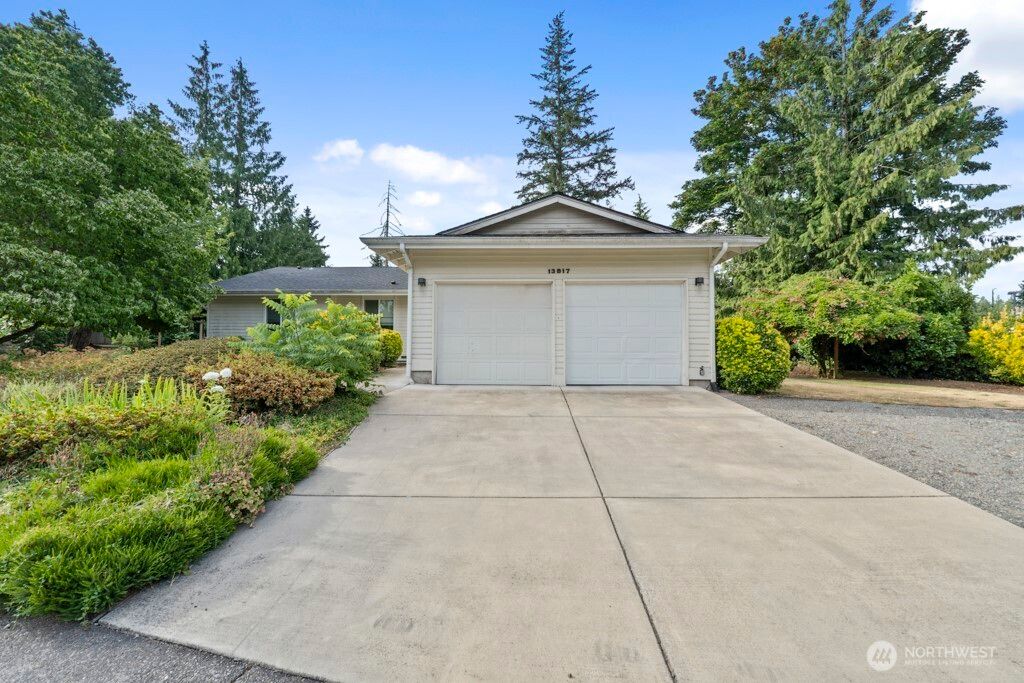 Photo of 13817 SE 3rd Place, Bellevue, WA 98005 (MLS # 2410849)