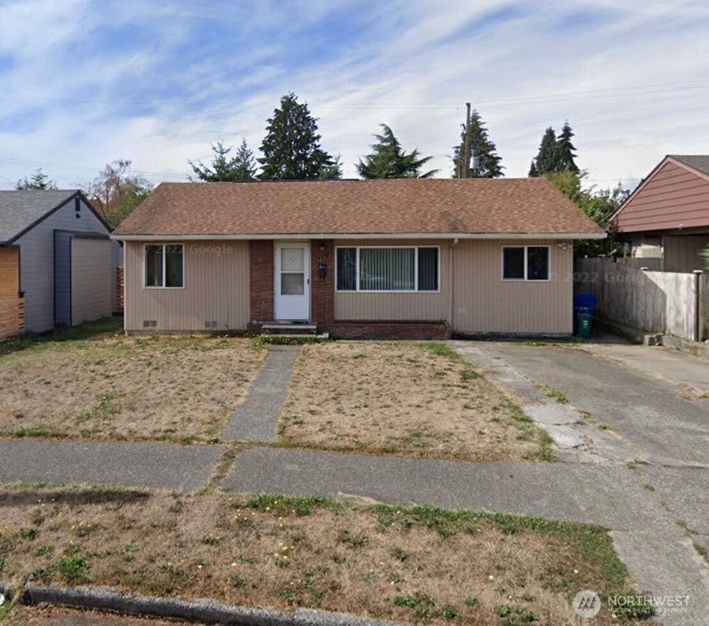 Photo of 9231 32nd Ave SW Ave, Seattle, WA 98126 (MLS # 2426841)