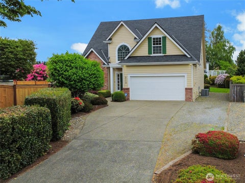 Photo of 2113 12th Ave AVE NW, Puyallup, WA 98371 (MLS # 2518973)