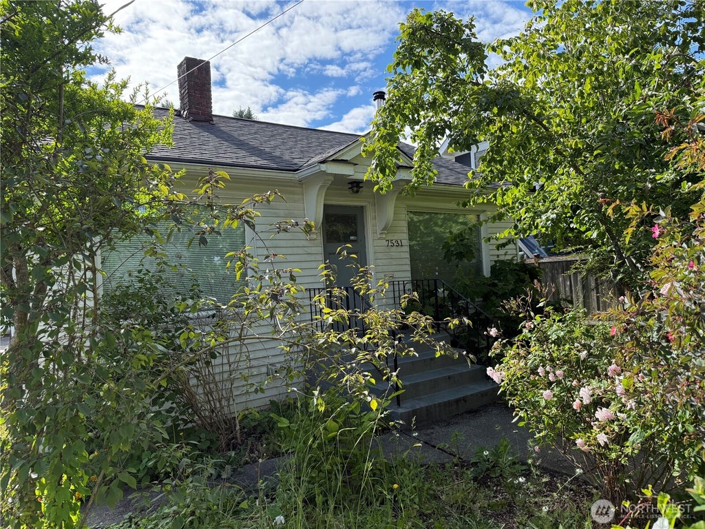 Photo of 7531 12th Avenue NW, Seattle, WA 98117 (MLS # 2540019)