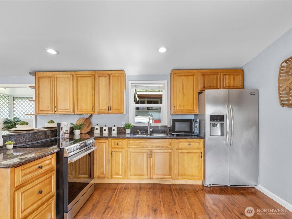 Photo of 7701 Hardeson Road #104, Everett, WA 98203 (MLS # 2390011)