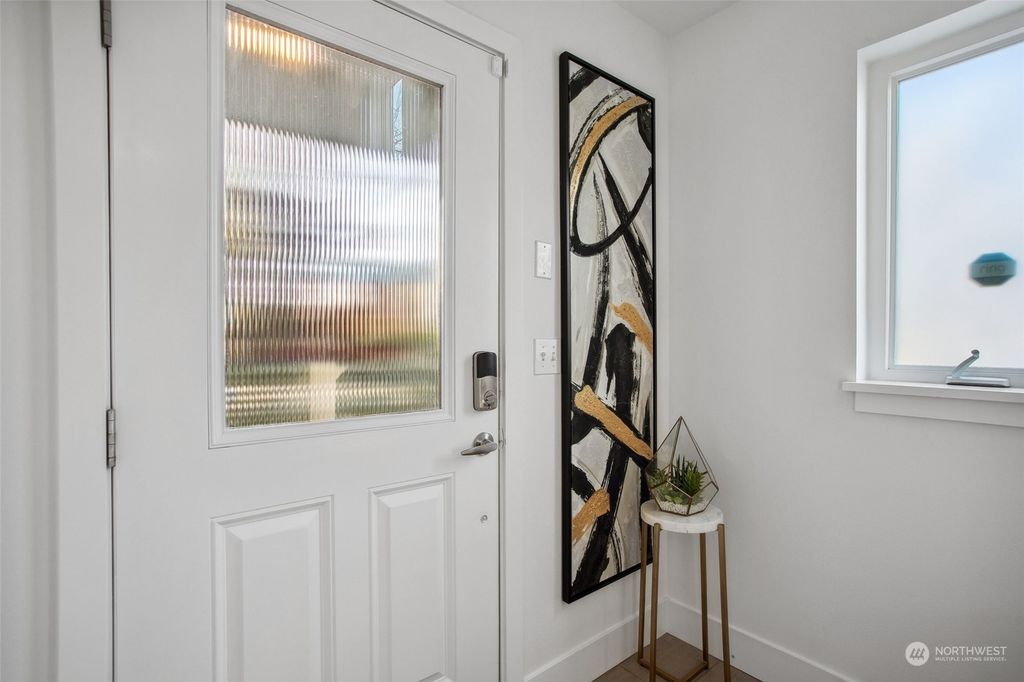 Photo of 418 N 130th Street, Seattle, WA 98133 (MLS # 2326595)