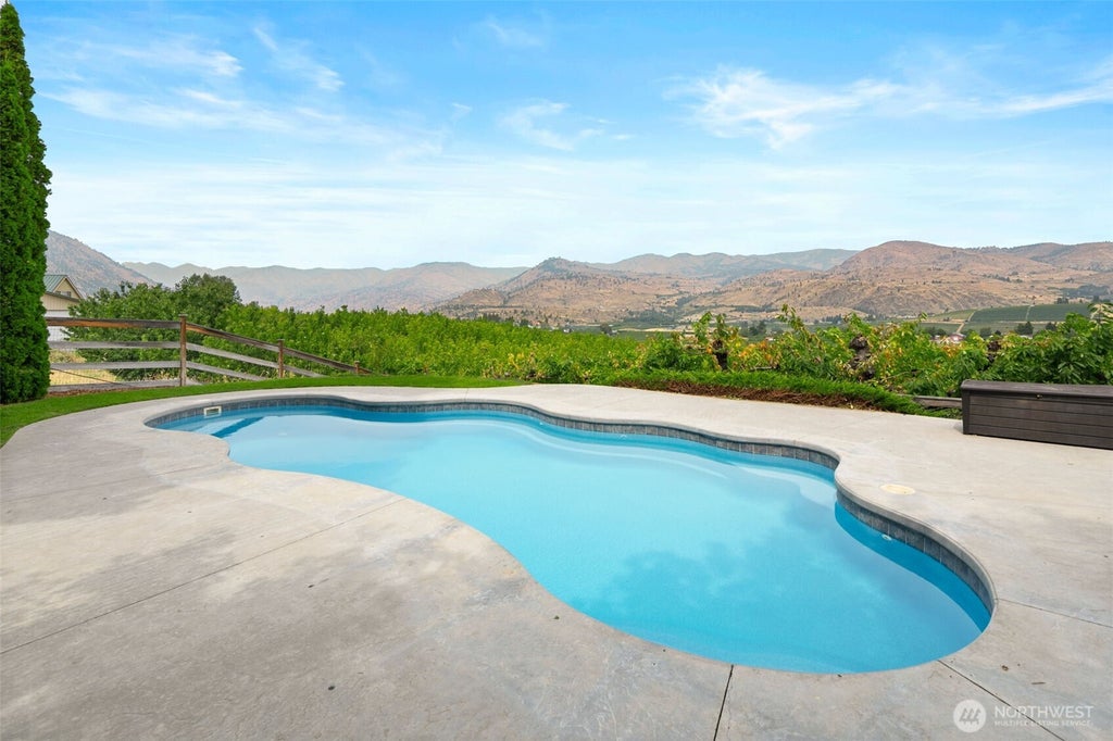 Photo of 820 Summit Boulevard, Manson, WA 98831 (MLS # 2554180)