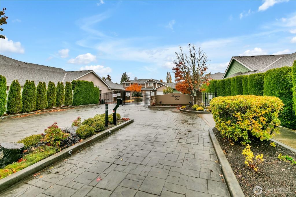 Photo of 10700 SE 260th Street #D101, Kent, WA 98030 (MLS # 2451304)