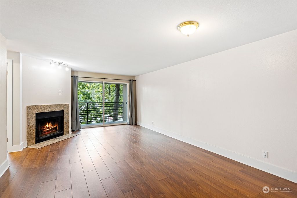 Photo of 7323 Sand Point Way NE #202, Seattle, WA 98115 (MLS # 1998158)