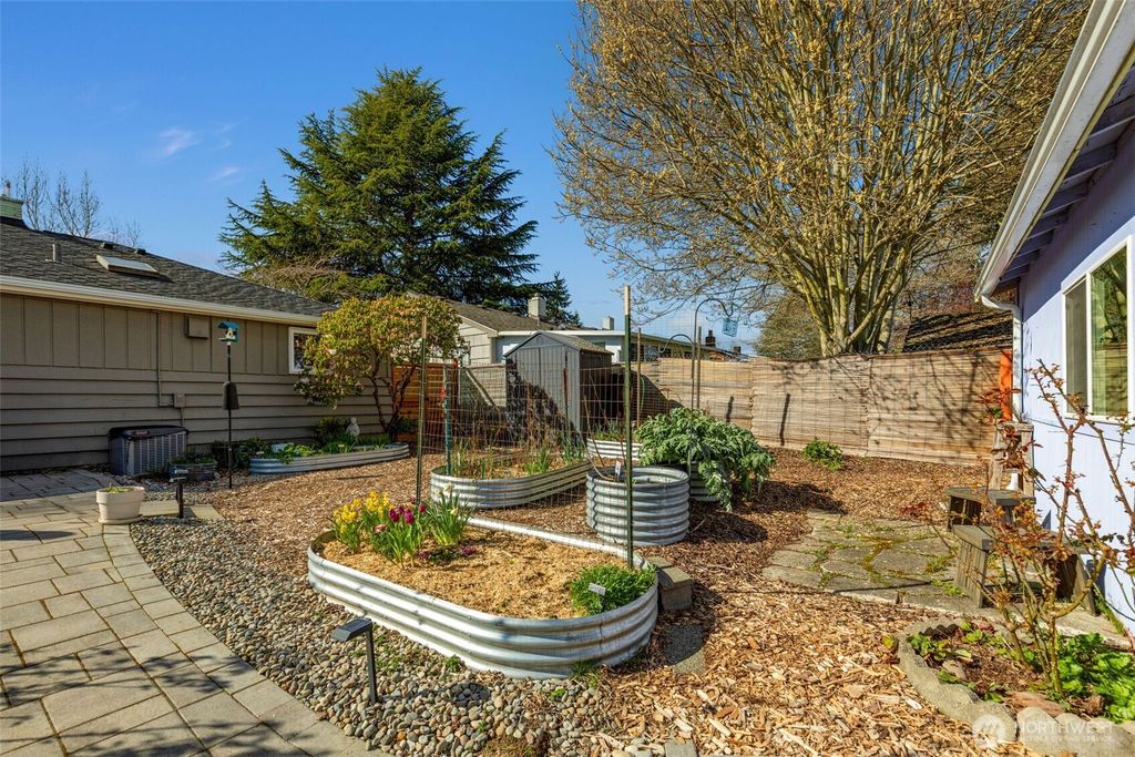 Photo of 9240 30th Avenue SW, Seattle, WA 98126 (MLS # 2495193)