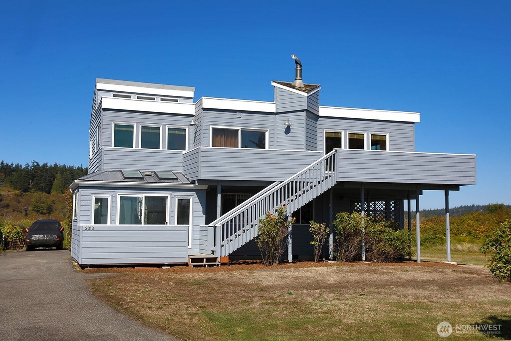 Photo of 2013 Shore Avenue, Freeland, WA 98249 (MLS # 2584130)