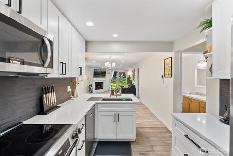 Photo of 12618 100th Ln Ne Ln #J146, Kirkland, WA 98034 (MLS # 2414360)