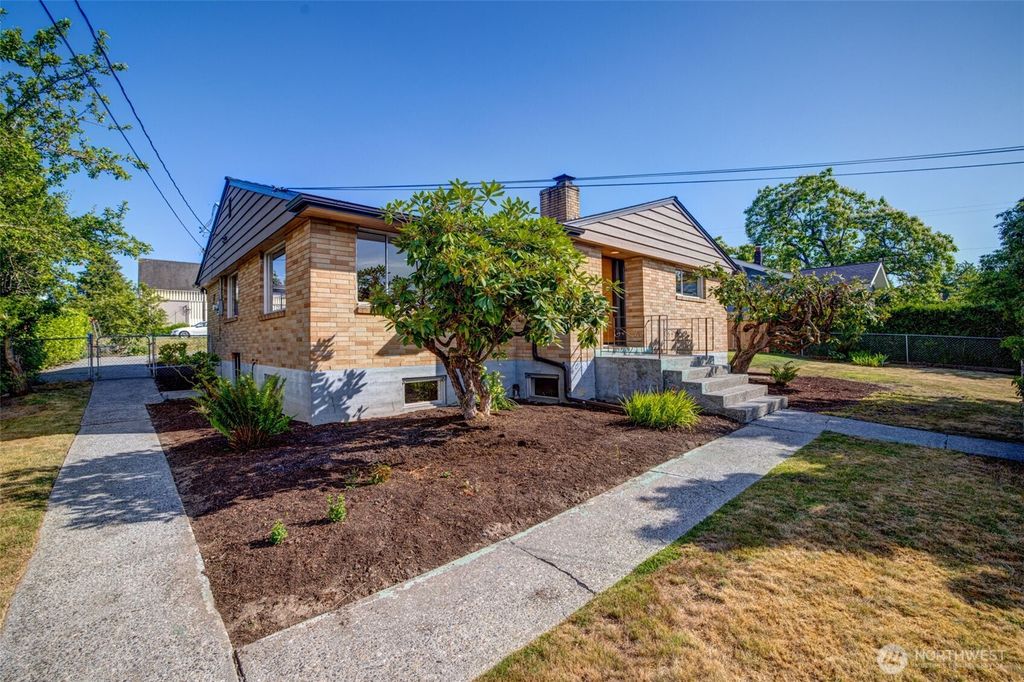 Photo of 6011 S Roxbury Street, Seattle, WA 98118 (MLS # 2402782)