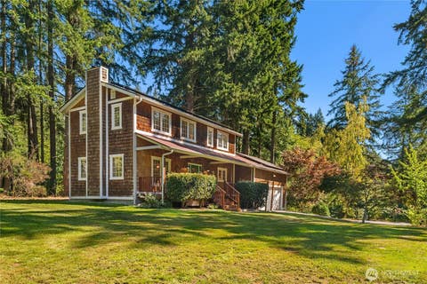 Photo of 9190 NE Ruys Lane, Bainbridge Island, WA 98110 (MLS # 2572571)