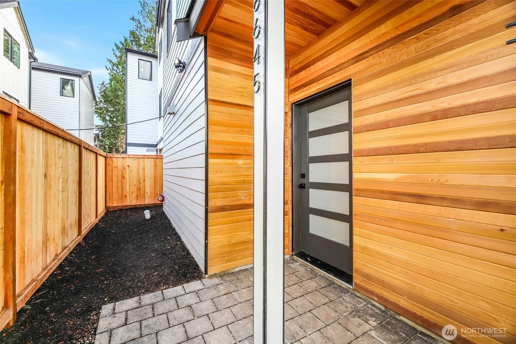 Photo of 8645 18th Avenue SW, Seattle, WA 98106 (MLS # 2352021)