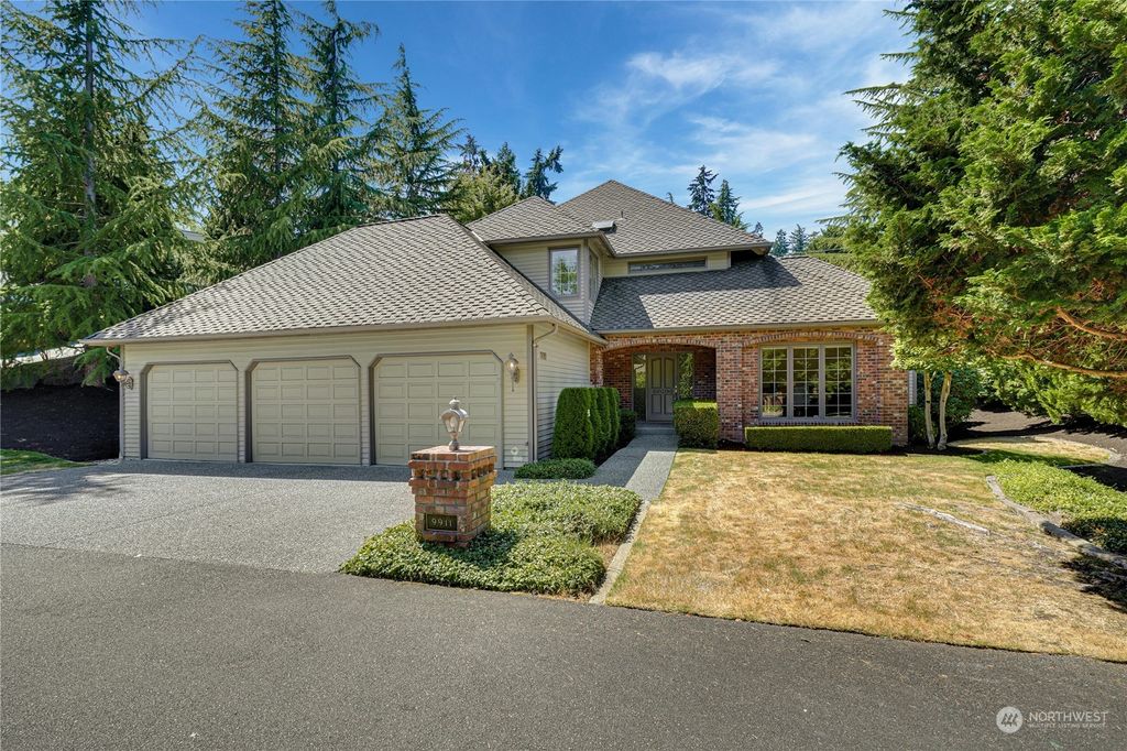 Photo of 9911 SE 5th Street St, Bellevue, WA 98004 (MLS # 2280160)