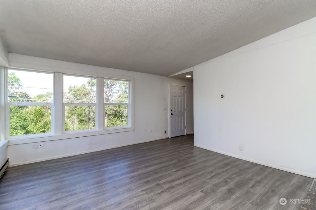 Photo of 10040 21st Avenue SW, Seattle, WA 98146 (MLS # 2244250)