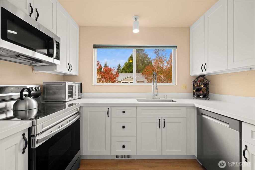 Photo of 12024 101 Avenue NE #E2, Kirkland, WA 98034 (MLS # 2509108)