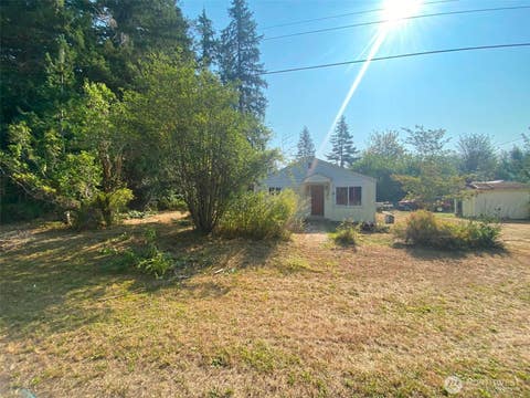 Photo of 292921 Highway 101, Quilcene, WA 98376 (MLS # 2516385)