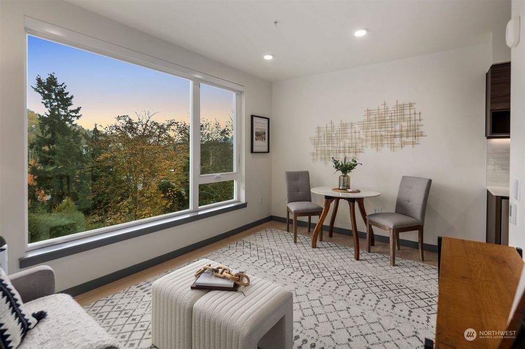 Photo of 11903 NE 128th St St #410, Kirkland, WA 98034 (MLS # 2304149)