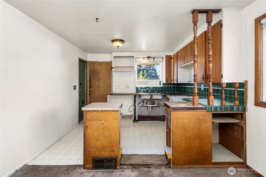 Photo of 1621 N 103rd Street, Seattle, WA 98133 (MLS # 2470573)