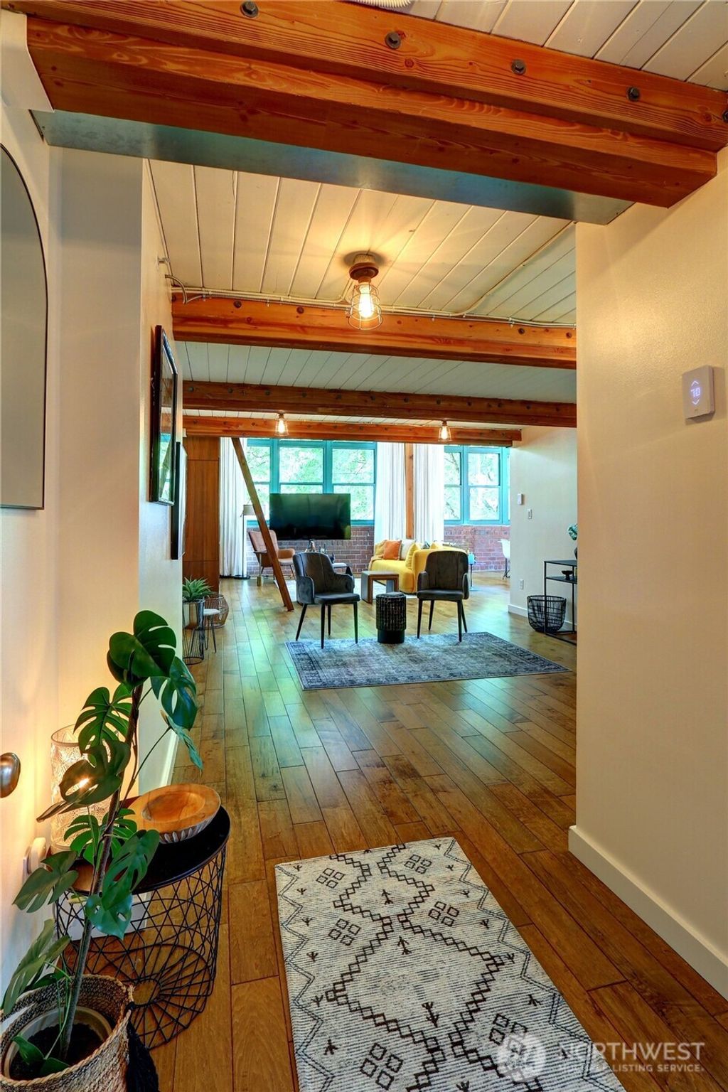 Photo of 66 Bell Street #102, Seattle, WA 98121 (MLS # 2369389)