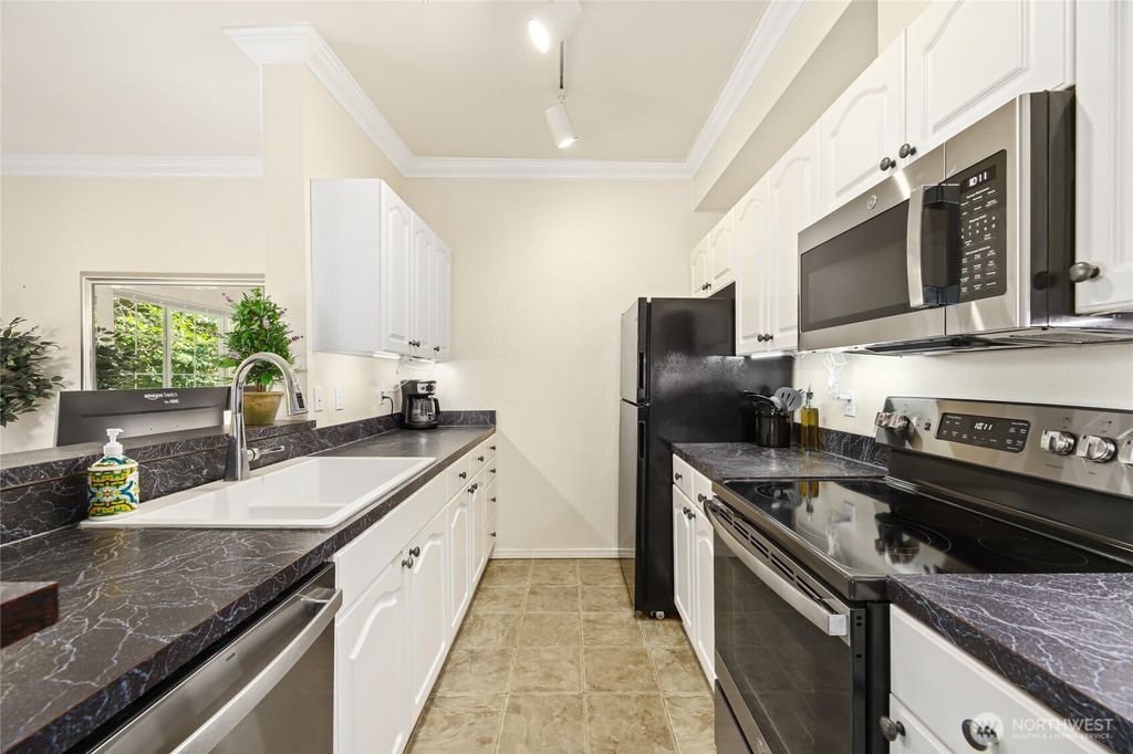 Photo of 801 Rainier Avenue N #E325, Renton, WA 98057 (MLS # 2503714)