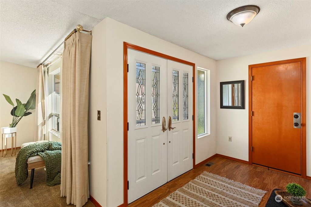 Photo of 24623 12th Avenue Ave S, Des Moines, WA 98198 (MLS # 2209522)