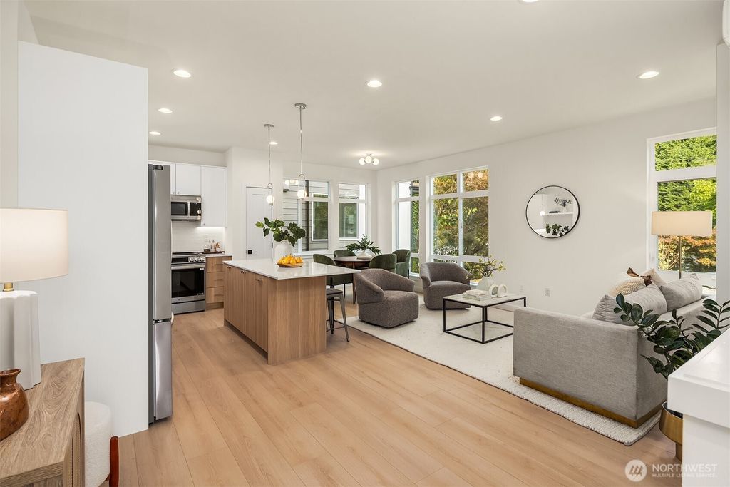 Photo of 10827 11th Avenue NE, Seattle, WA 98125 (MLS # 2443846)