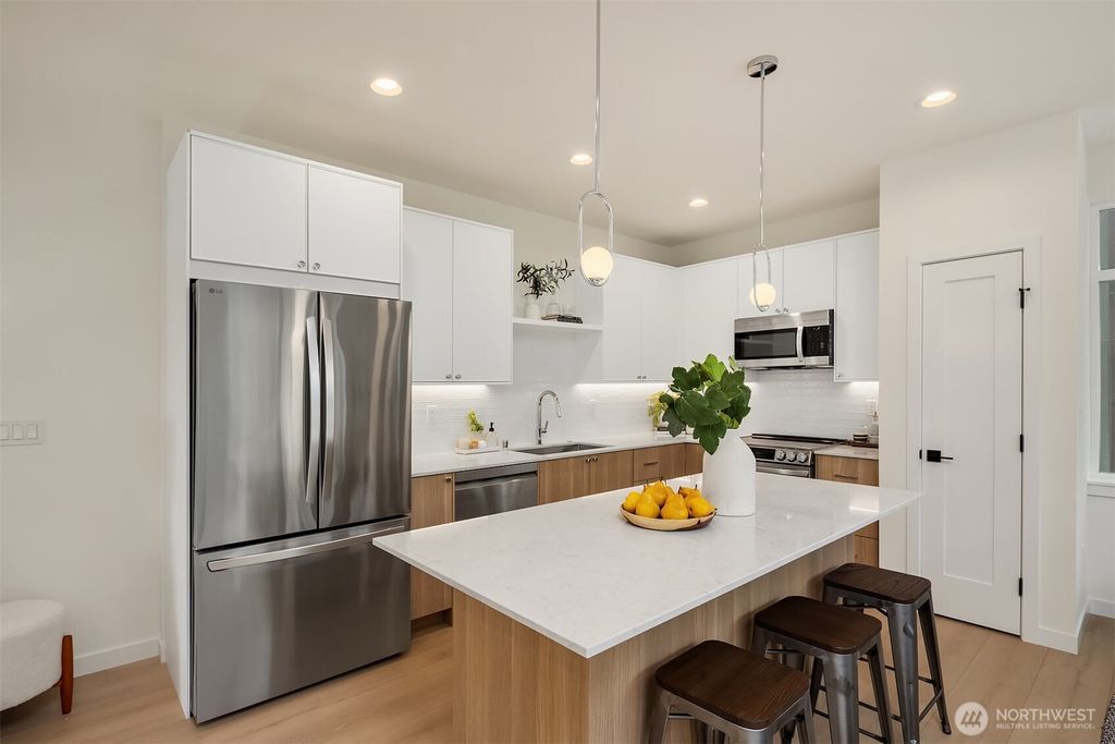 Photo of 10827 11th Avenue NE, Seattle, WA 98125 (MLS # 2443846)