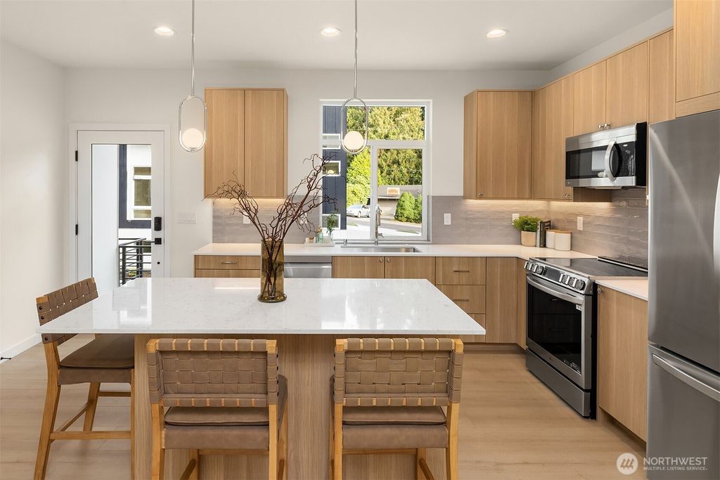 Photo of 10827 11th Avenue NE, Seattle, WA 98125 (MLS # 2443846)