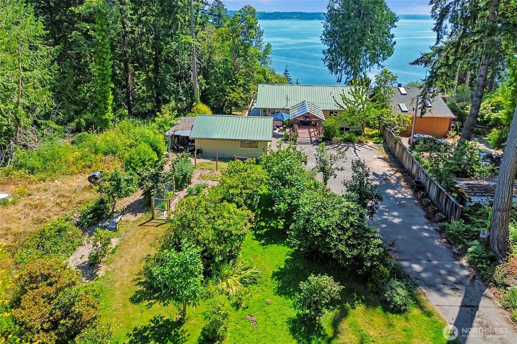 Photo of 7324 Puget Beach Road NE, Olympia, WA 98516 (MLS # 2555697)