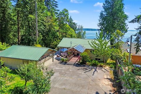 Photo of 7324 Puget Beach Road NE, Olympia, WA 98516 (MLS # 2555697)