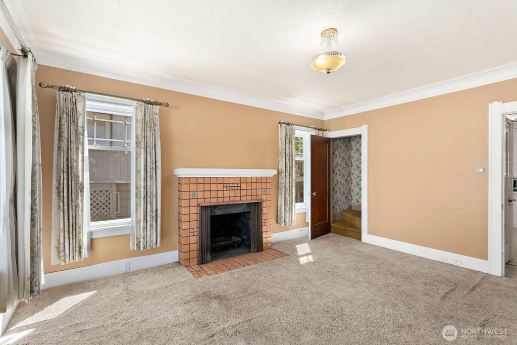 Photo of 215 N 58th St St, Seattle, WA 98103 (MLS # 2413670)